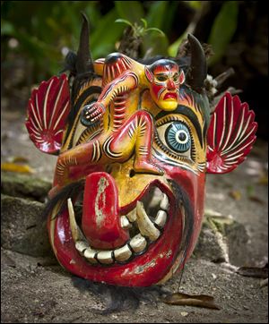 An antique Mayan Mask on display at the Maya Palms Resort in Mahahual, Mexico. 